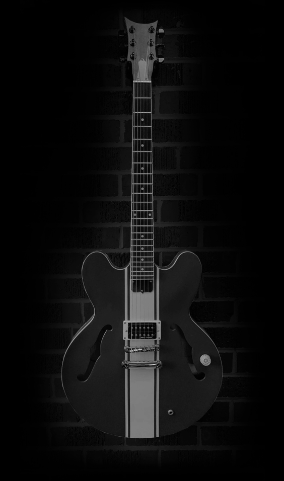 guitar on brick background